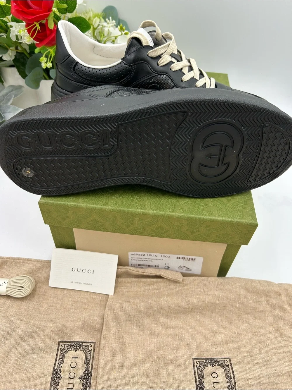 Men's Gucci, GG embossed, black leather sneakers size 11 fits 11.5 made in Italy